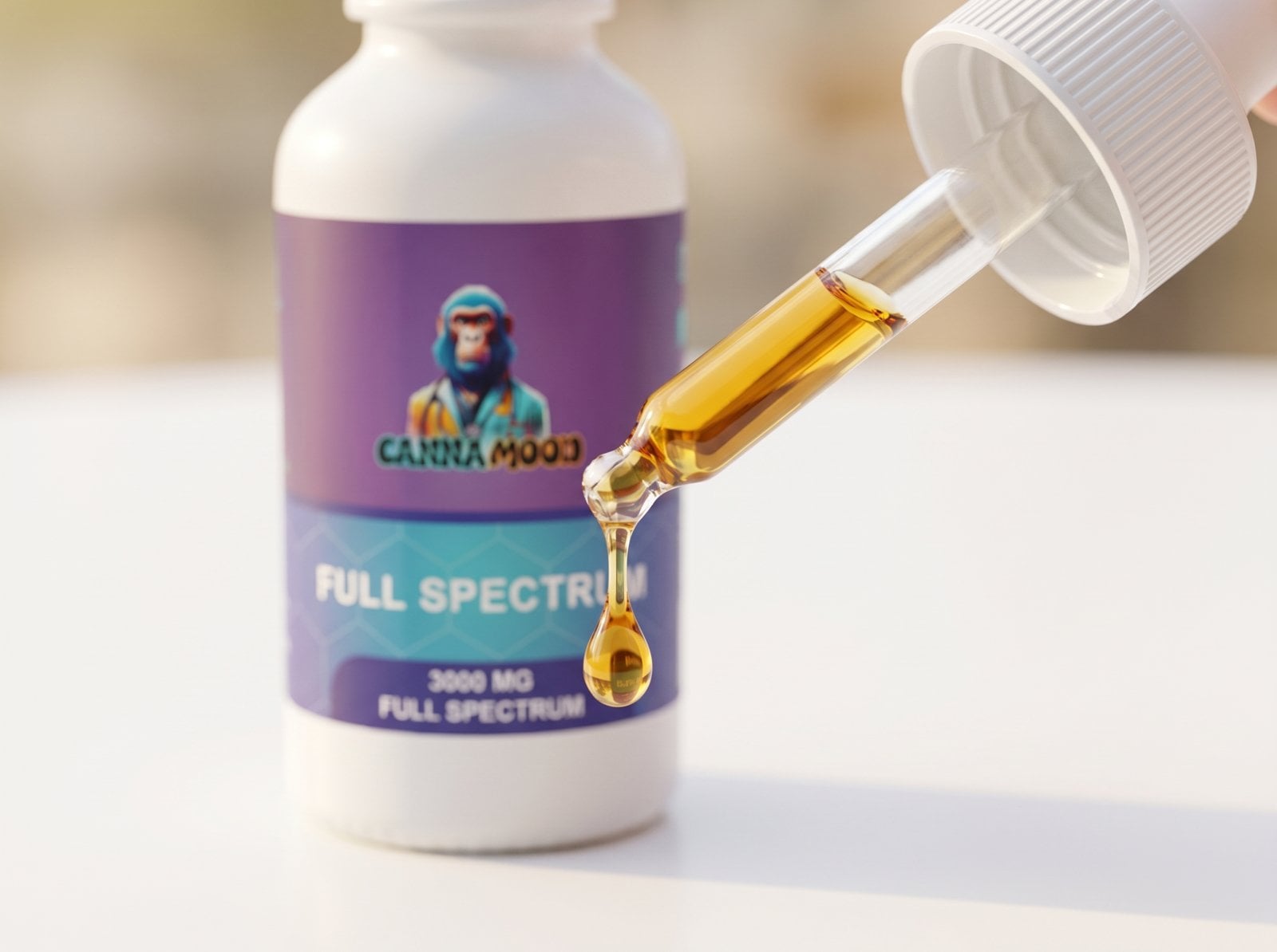 Close-up of Canna Mood CBD tincture dropper releasing a golden amber drop of CBD oil against a soft blurred background