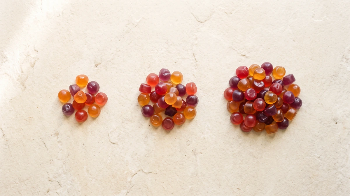 Graduated piles of CBD gummies showing that more milligrams is not always stronger